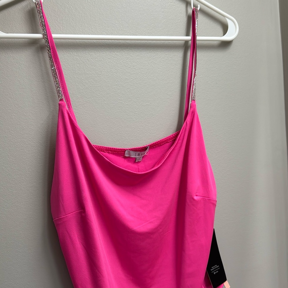 Hot pink bodysuit size L
New with tags